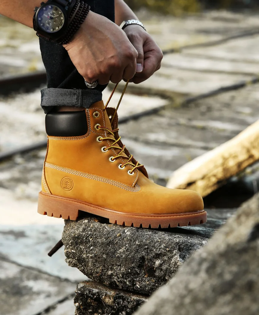 Lacing a hiking boot.