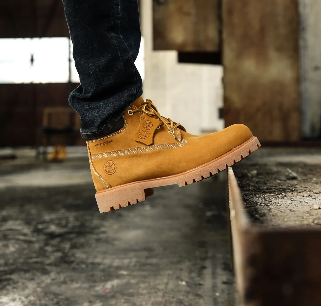 A walking boot on a low step.