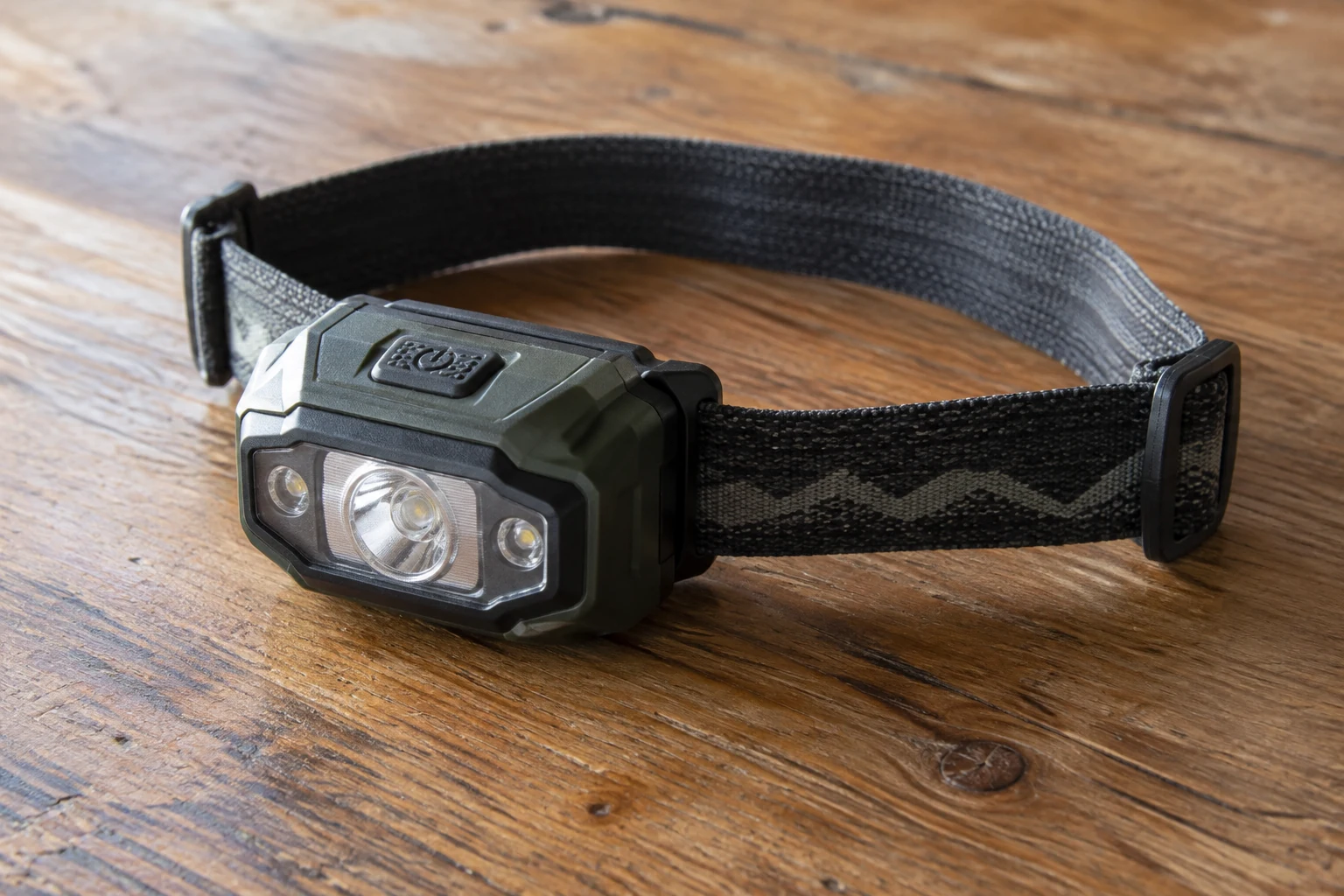 A compact headlamp with an adjustable headband.