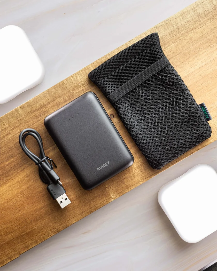 A power bank, cable and small storage pouch.