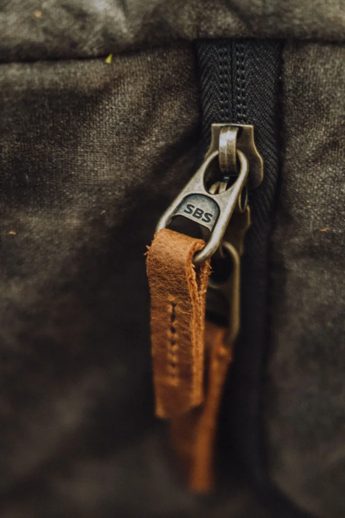Close view of a bag zipper.