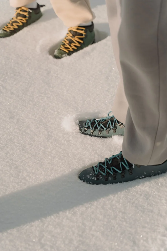 Laced hiking boots in winter conditions.